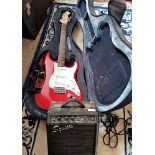 A Squier Fender electric Guitar & Squier Amplifier