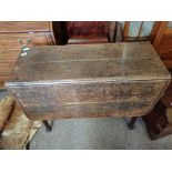 Georgian oak drop leaf table with pad feet