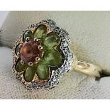 9ct gold 375 ring designer basket with green stones and pink1/2 ct centre stone edged in white