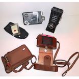 4 Cameras including Kodak automatic 8moviecamera, Zeiss Ikon and Agfa Isolette latter both in case