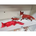 3 Beswick foxes and 4 figures