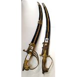 2 x reproduction brass swords