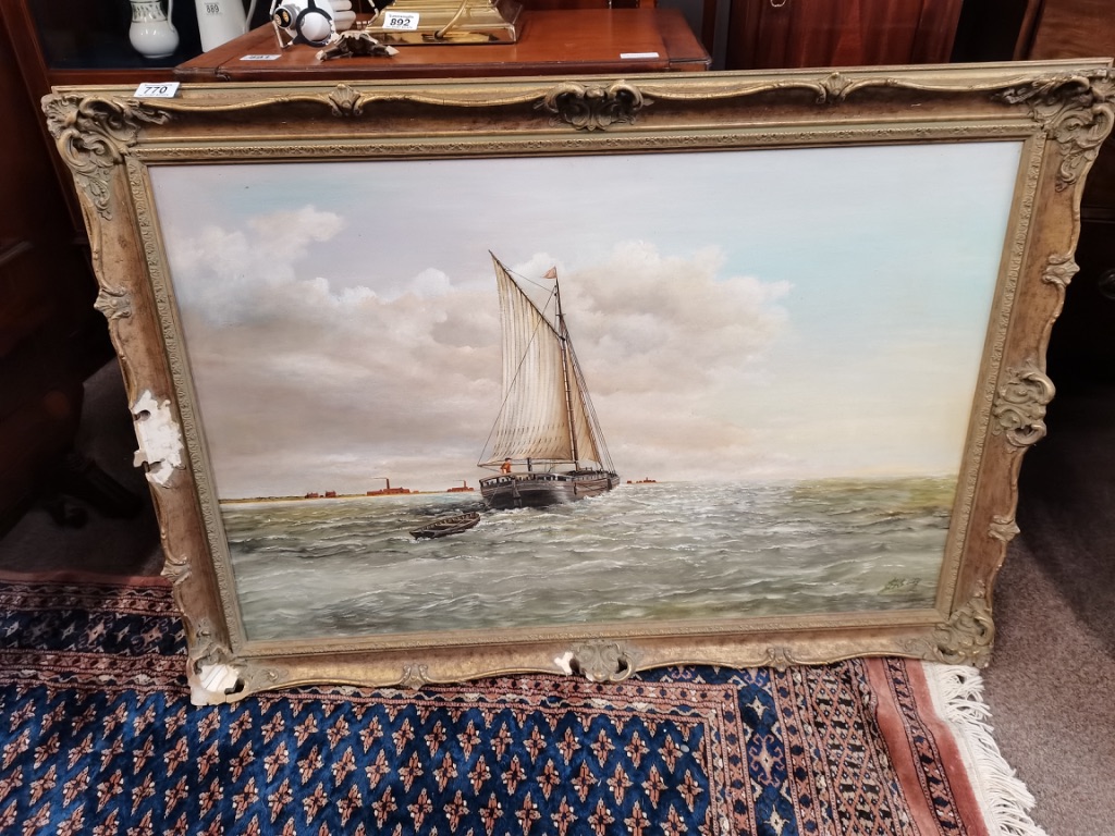 An oil on board of a sailing boat signed 73cm H 104cm W