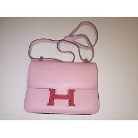 A Boxed Pink leather Ladies Handbag marked HERMES Paris in excellent condition with dust bag, etc