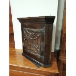 Small carved corner cupboard