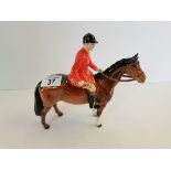 Beswick huntsman standing four square on brown horse
