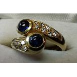 18 ct Diamond snake ring two headed with 2 coubochon sapphires size J as new