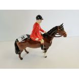 Beswick huntsman standing four square on brown horse