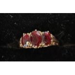 9ct ornate ring ornate decoration with 3 large red stones size M