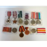 Collection of foreign medals India, Pakistan, West Germany, etc. Some named to recipients