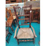 Early Oak Lancashire spindle back chair with rush seat