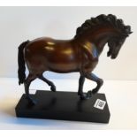 Figure of a horse on stand