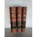 3 x volumes of DON QUIXOTE in red leather good condition