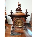 Antique mahogany and brass faced mantle clock