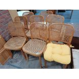 8 cane seated dining chairs