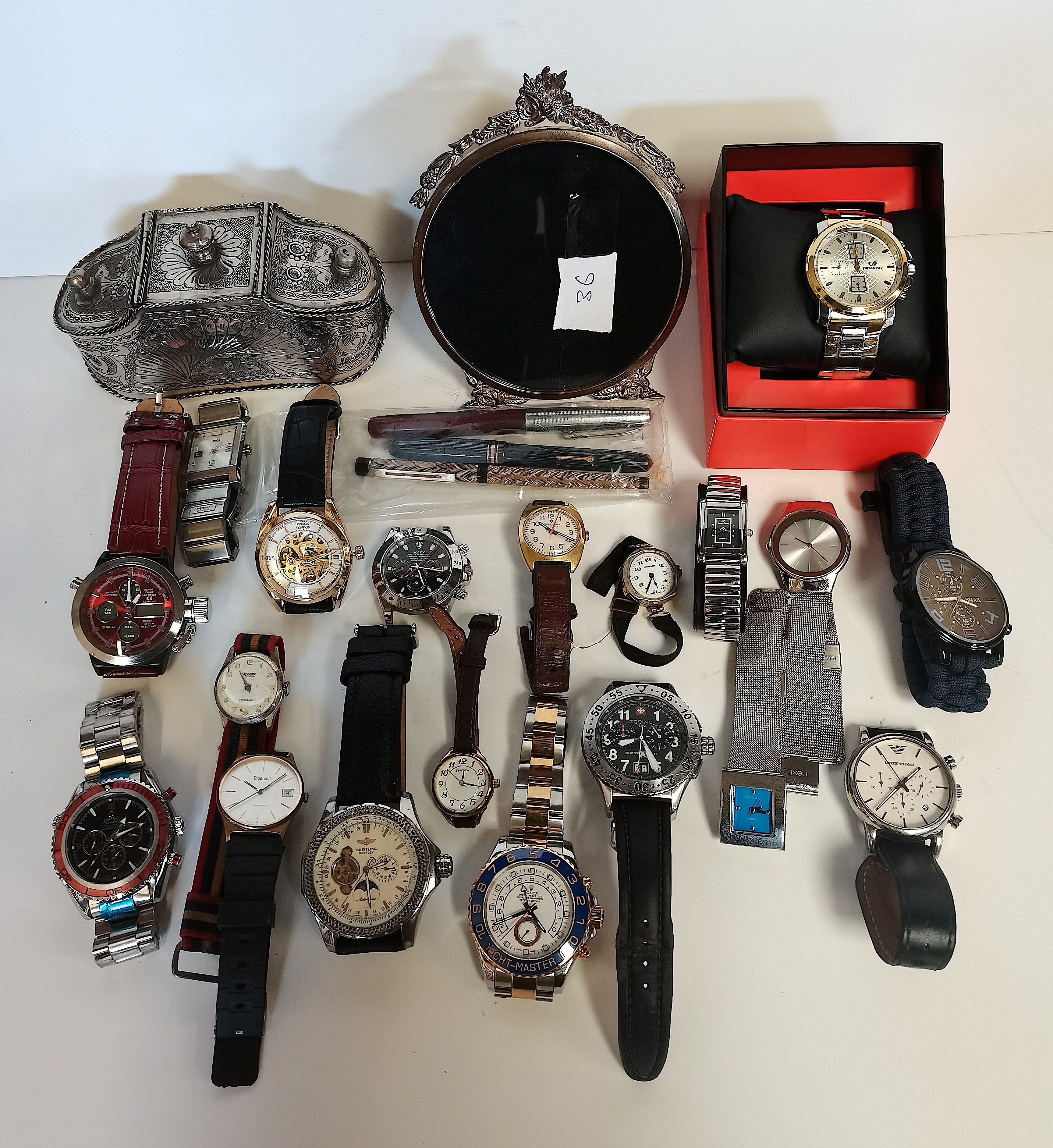 Watches, pens, photo frame etc