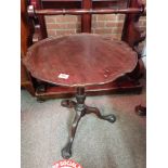 Antique Mahogany tripod table with ball and claw feet