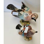 Large Beswick Jay with repair to tail and small Jay with repair to left wing
