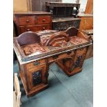 Victorian pedestal desk with marble top and tiled back
