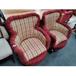 pair of upholstered arm chairs