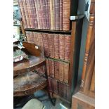 Antique oak book shelves with a set Punch books 1-100 bound in red leather plus collection of Punch