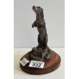 silvered otter figure and DUNLOP golfing figure