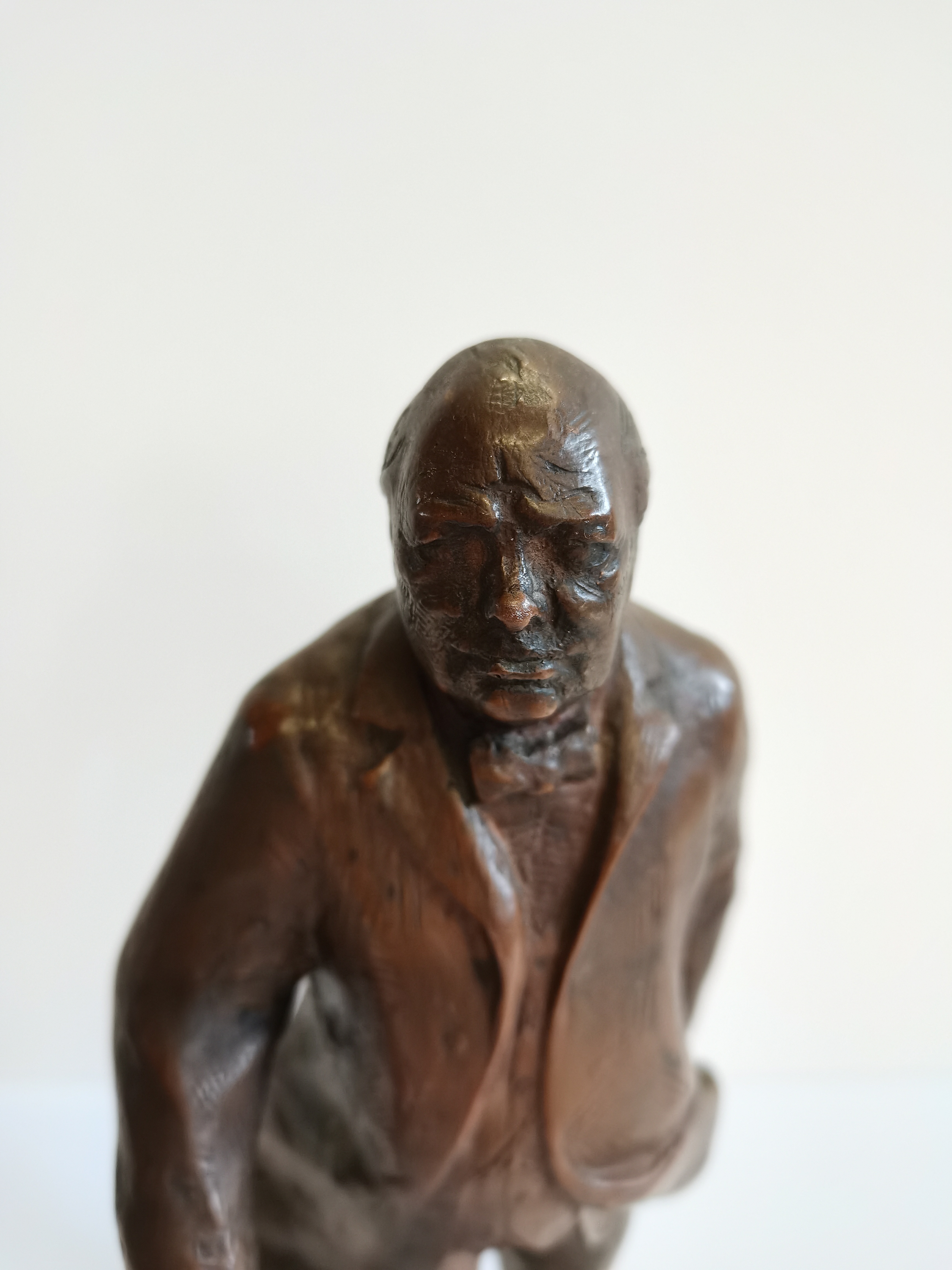 A bronze figure 22cm of Winston Churchill figure signed