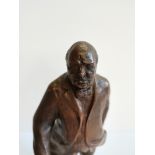 A bronze figure 22cm of Winston Churchill figure signed