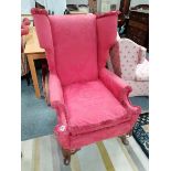 red upholstered arm chair