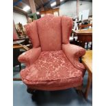 Queen Anne style high backed chair