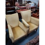 2 gold upholstered arm chairs