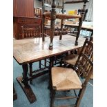 oak dining table with 5 rush seater chairs