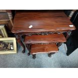 nest of mahogany tables