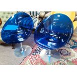 Two EROS by Kartell with S+ ARCK blue club chairs