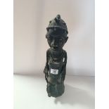 Benin bronze style figure of a seated man 43cm