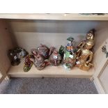 6 Various Oriental Items 2 Glass Paerweights 1 Brass Candlestick 1 african Type coloured mask and