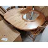 Extending pine dining table with 2 chairs