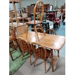 Ercol table and 5 ercol spindle backed chairs