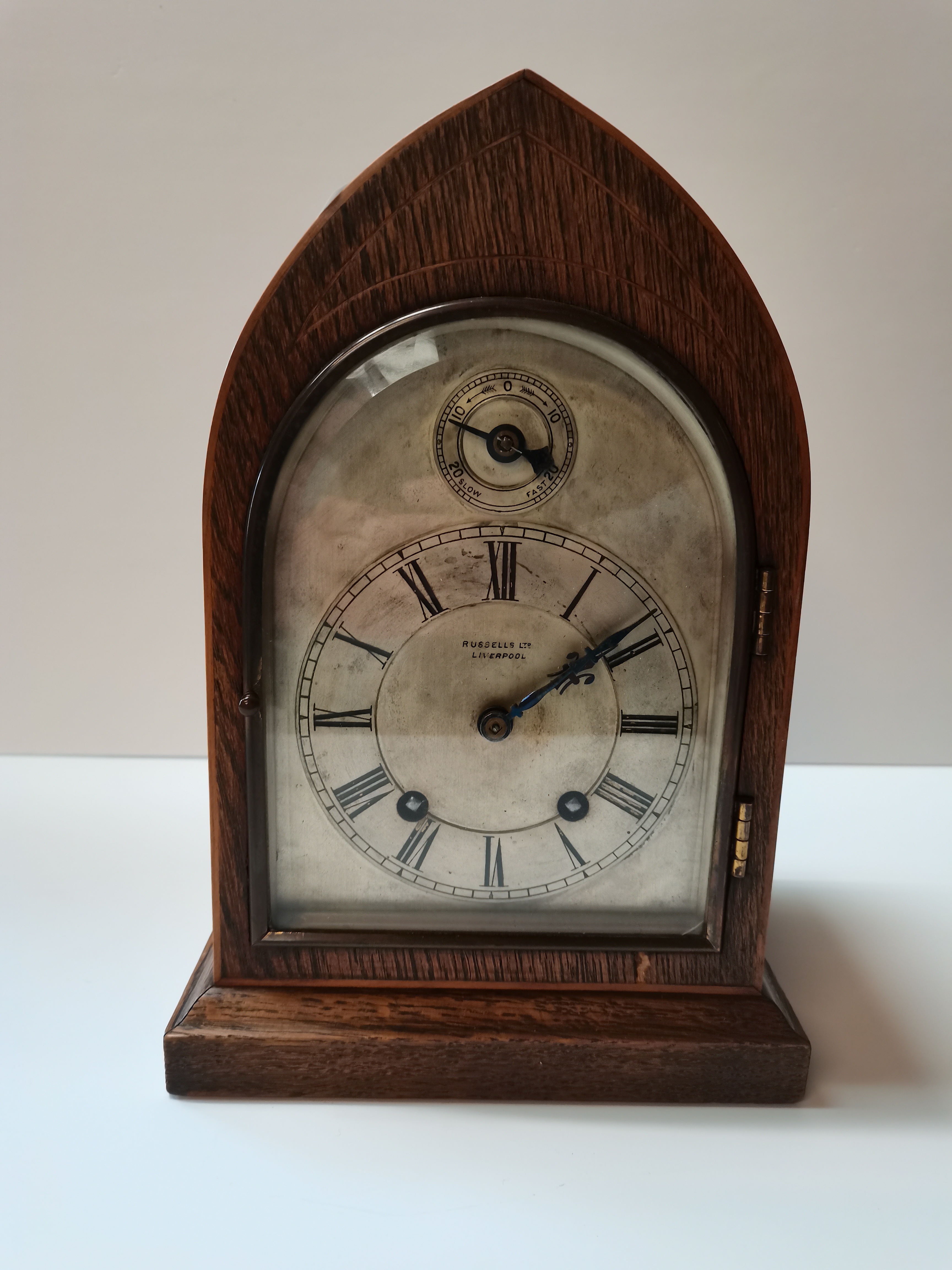 Oak mantle clock by Russell ltd Liverpool