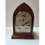 Oak mantle clock by Russell ltd Liverpool
