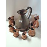 7 Copper Measuring Jugs with customs Lead Seal and measurments marked