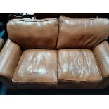 Tan retro style sofa