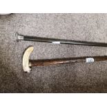 Silver topped walking stick and bone topped stick