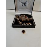 Gold watch and bracelet and fob