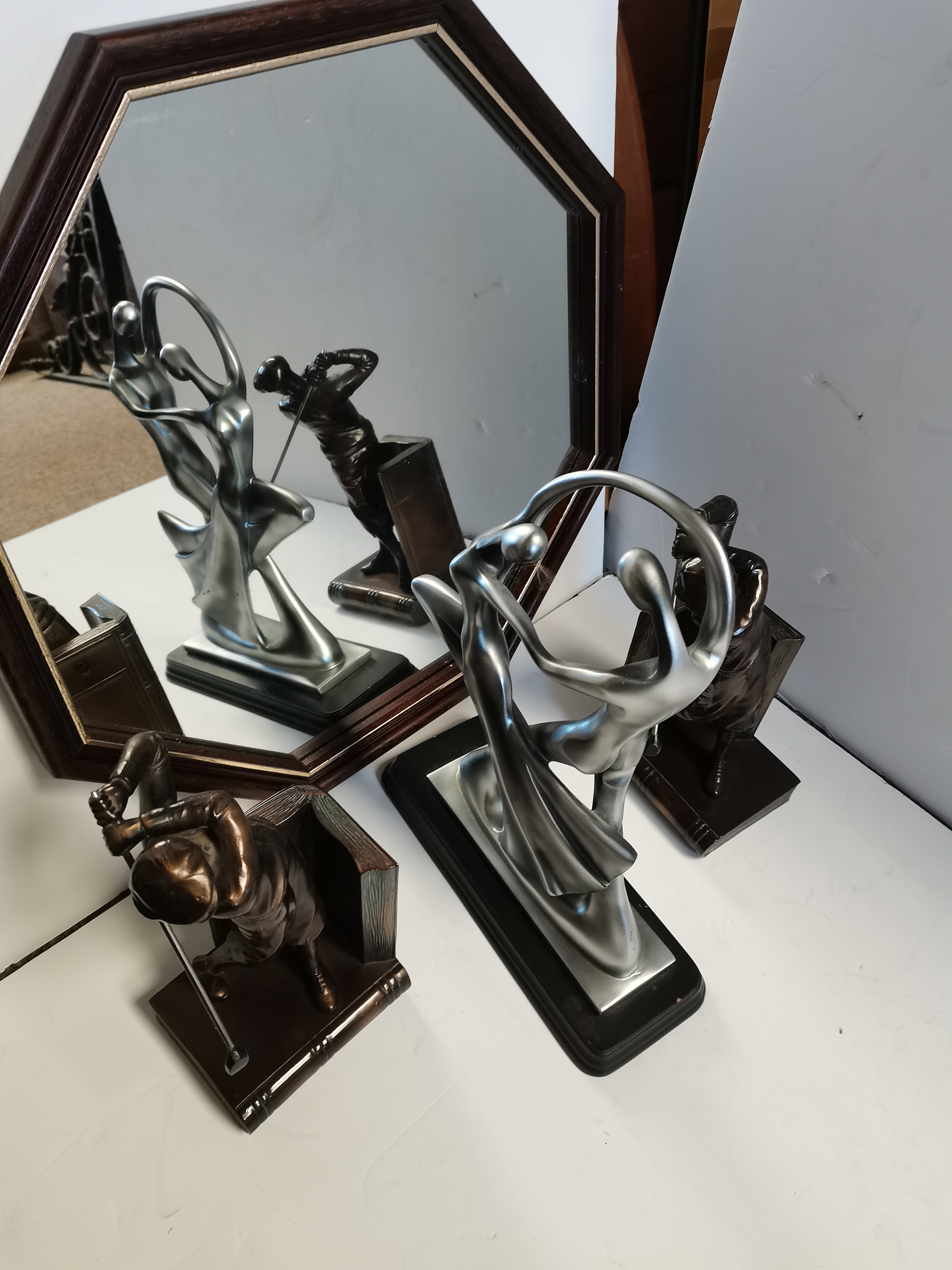 A Collectors lot including 2 Steering Wheels , Dressing Table Glass Set Golfing Figure Book Ends ,