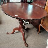 Antique mahogany drop leaf table with pie crust edge