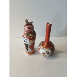 2 small orange oriental Vases