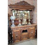 Antique oak green man mirror backed sideboard