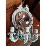 Continental porcelain wall mirror with cherubs