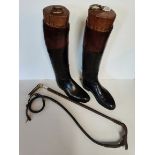Leather riding boots with wooden trees and whip